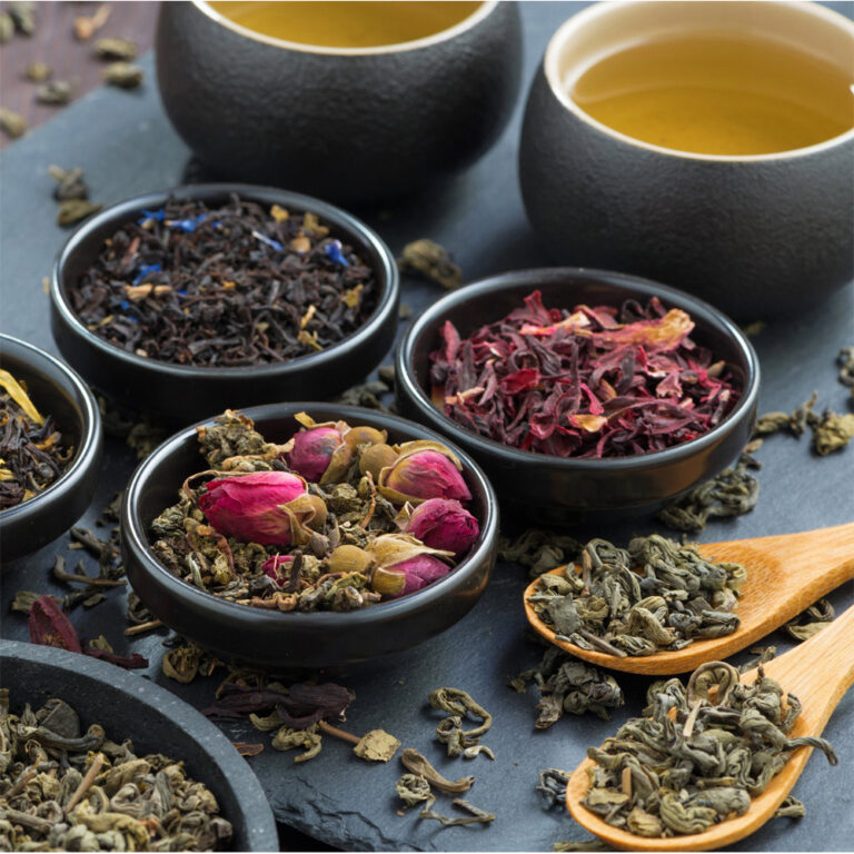 assortment of fragrant dried teas and green tea, close-up, horizontal